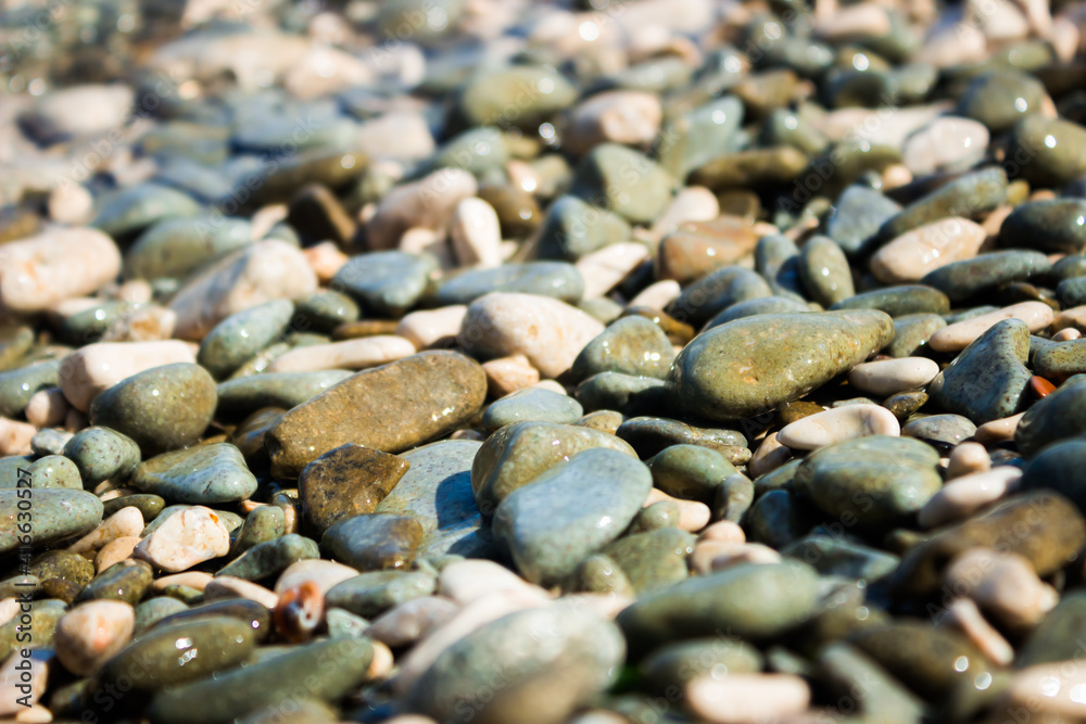 The pebbles of the stone beach in Feodosia, the Black Sea coast, Eastern Crimea.	