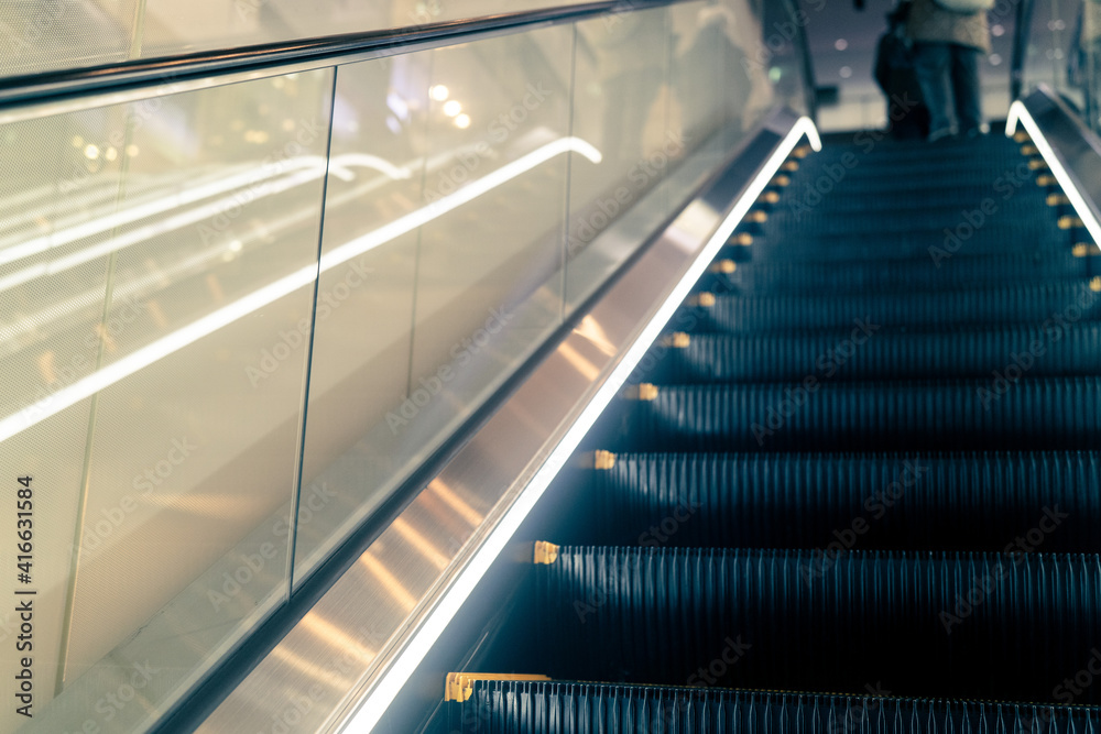 moving escalator in the airport moving escalator in the airport