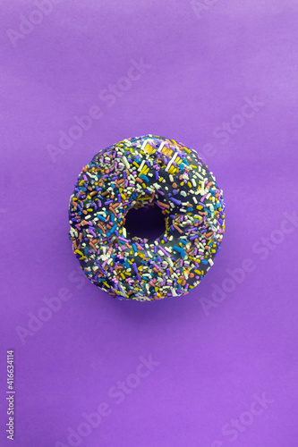 Donuts with sprinkles isolated on background