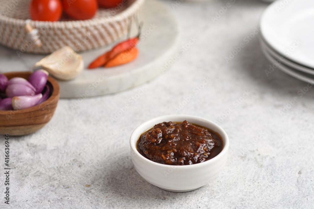 Sambal is one of Indonesian signature condiment, made from chili, garlic, shallot, and tomato. Sambal is one of Indonesian signature condiment, made from chili, garlic, shallot, and tomato.
