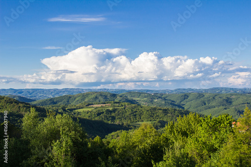 View from Mount Kablar, western Serbia. Beautiful landscape, hills and amazing cloud. © Dragan
