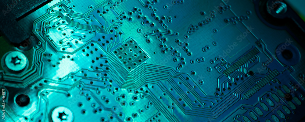 Close-up of electronic circuit computer microchips in neon colors - obrazy, fototapety, plakaty 