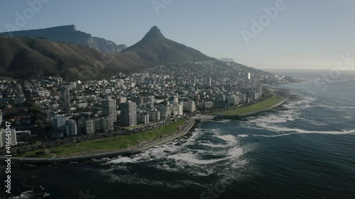 Aerial view of Cape Town, Western Cape, South Africa, with Cape peninsula, Green Point, V and A waterfront, Cape Town Stadium, De Waterkant, on a bright and sunny day filmed in 4k with a drone