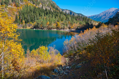 Fototapeta Naklejka Na Ścianę i Meble -  Third Baduk lake in autumn. Dombay, Karachay-Cherkessia, Russia. 