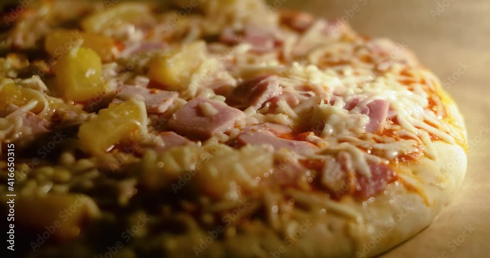 Delicious American Pizza Hawaii is bake in the home oven in time lapse Delicious American Pizza Hawaii is bake in the home oven in time lapse