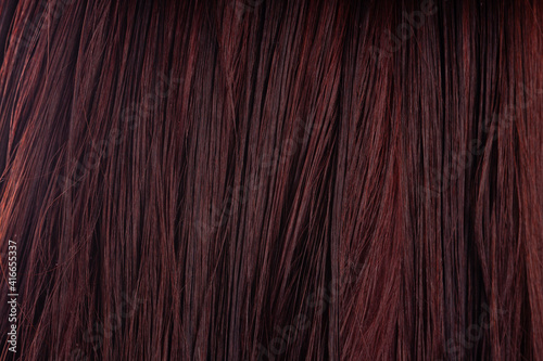 Texture women's wet hair. Close-up of human hair. Beautiful long female hair as background