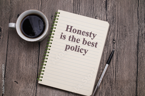 Honesty is the best policy, text words typography written on book against wooden background, life and business motivational inspirational