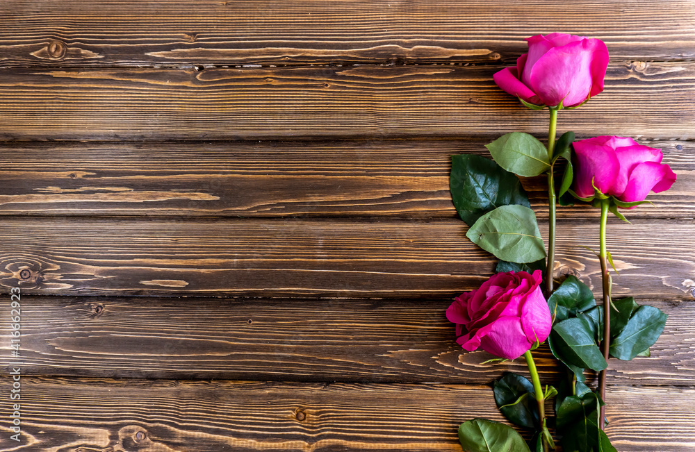 Flat Lay, Flower layout Pink roses on wooden background