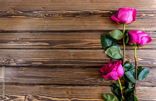 Flat Lay  Flower layout Pink roses on wooden background