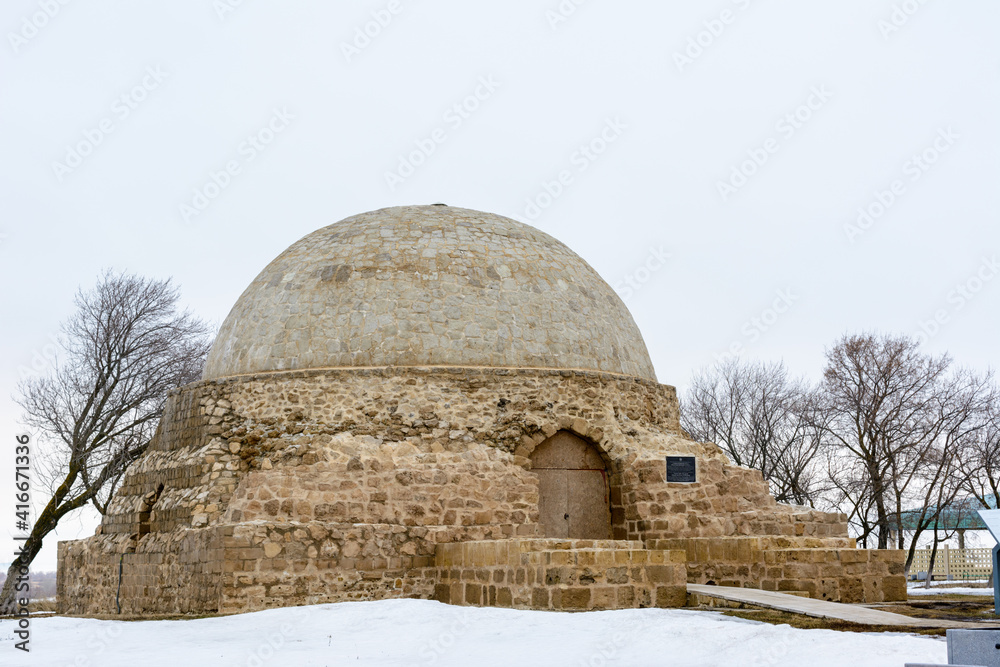 Bulgarian settlement. Limestone Northern Mausoleum on a cloudy spring day in Bolgar.