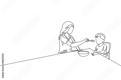 Εκτύπωση καμβά One continuous line drawing of young mom feeding her sick fever son while siting on dining chair at home