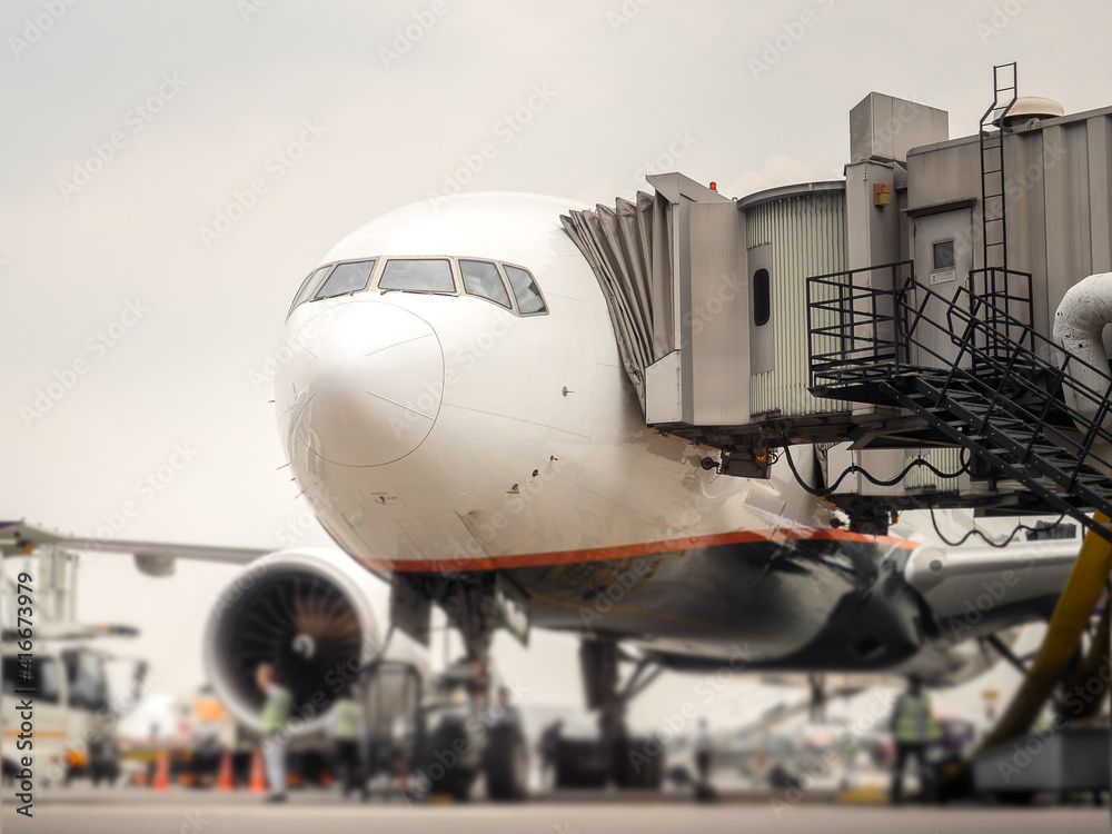 Airplane near the terminal in an airport