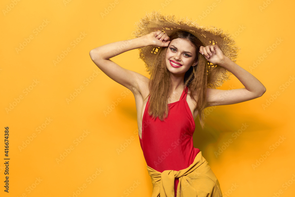 Woman in straw hat bright makeup summer lifestyle fun yellow background Woman in straw hat bright makeup summer lifestyle fun yellow background