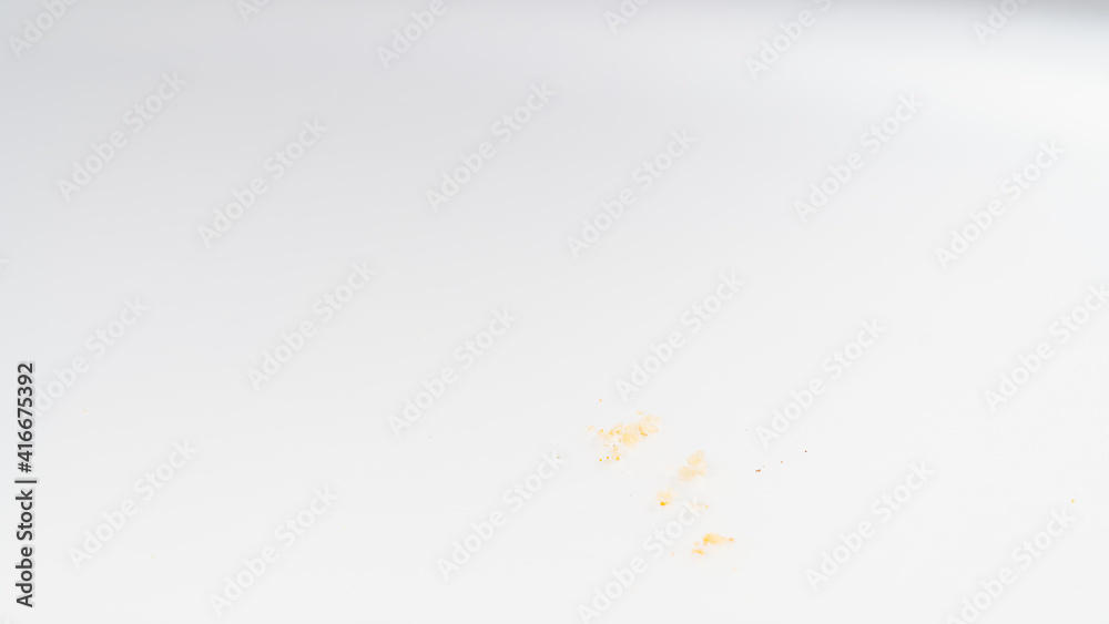Fototapeta premium sixth. series of six photos.eating Chocolate cupcake with cream.white background