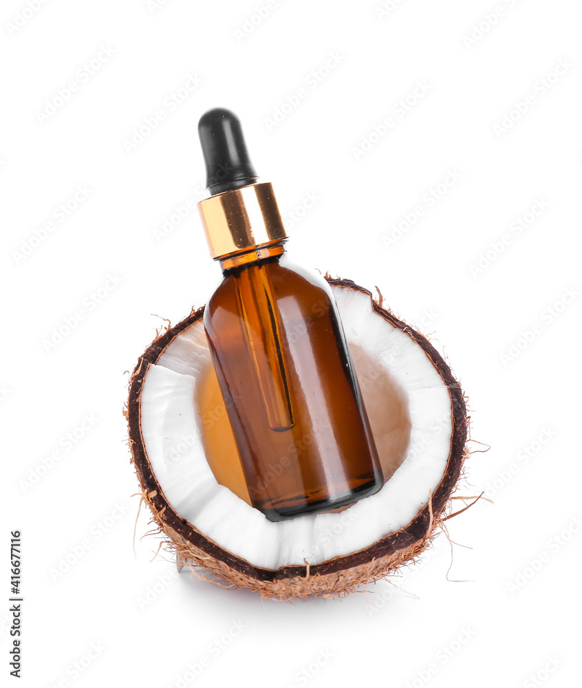 Fototapeta premium Bottle of coconut oil on white background