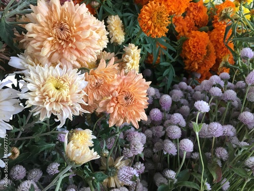 Bouquet of summer flowers for sale at the farmers market, featuring Dahlias and Zinnias