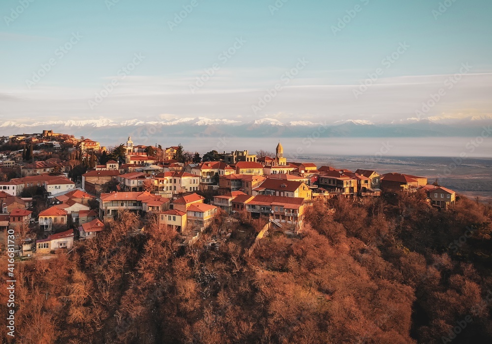 Love city Sighnaghi aerial view with caucasus mountain blank space background. Travel destination Georgia