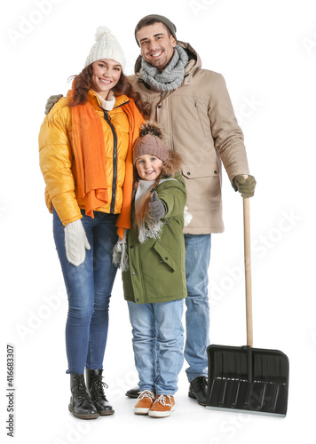 Family with shovel for remo...