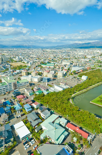 Outer moat of goryokaku park and goryokaku Tower in Hakodate, Hokkaido, Japan.