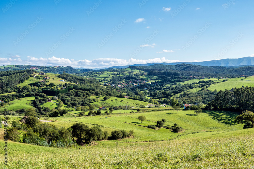 Green hills and meadows nearby the town of Comillas, cantabria, Spain