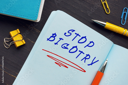 Fotografija STOP BIGOTRY inscription on the sheet