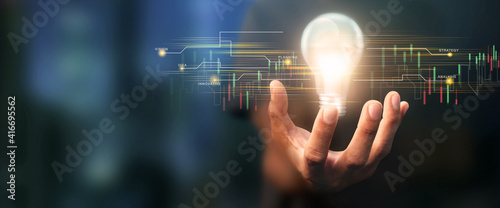 Businessman holding the glow light Data digital marketing graph in dark background. 3D illustration in Technology concepts.