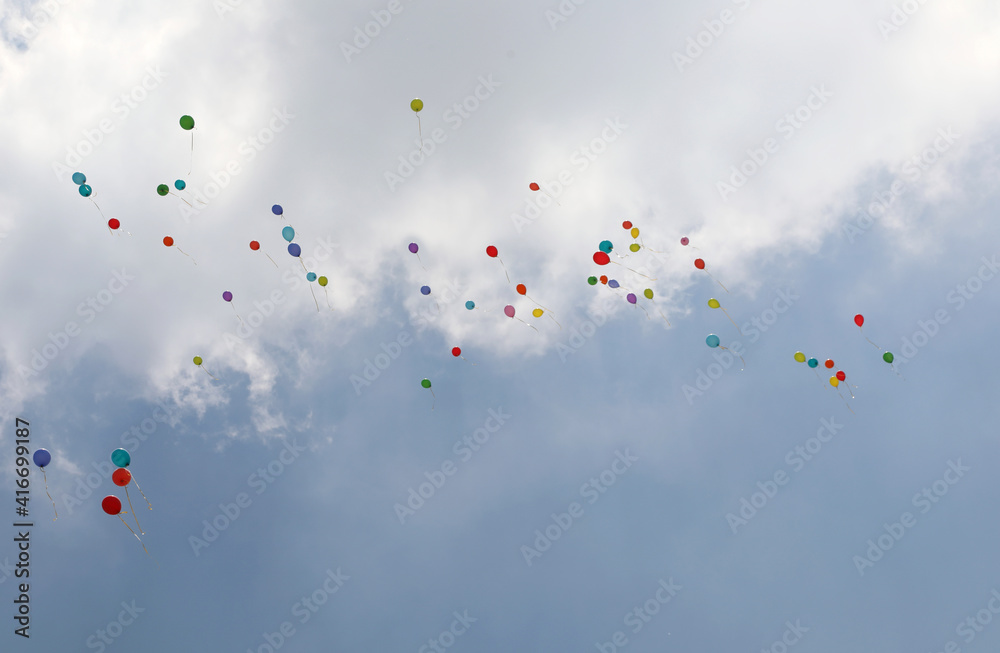 colorful balloons fly high in the sky after the big celebration colorful balloons fly high in the sky after the big celebration