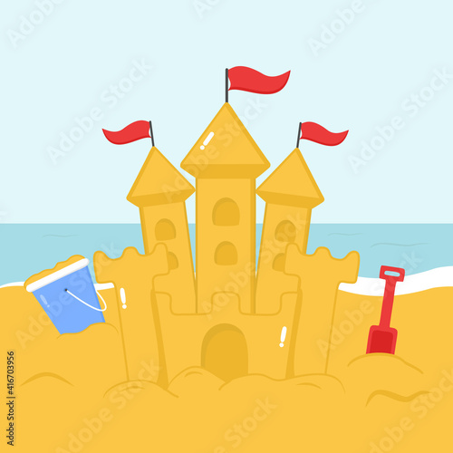 illustration of a sand castle on the beach on vacation with a shovel and bucket full of sand
