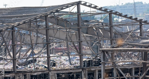 damage to warehouses and equipment at the Beirut port after an explosion in August 2020