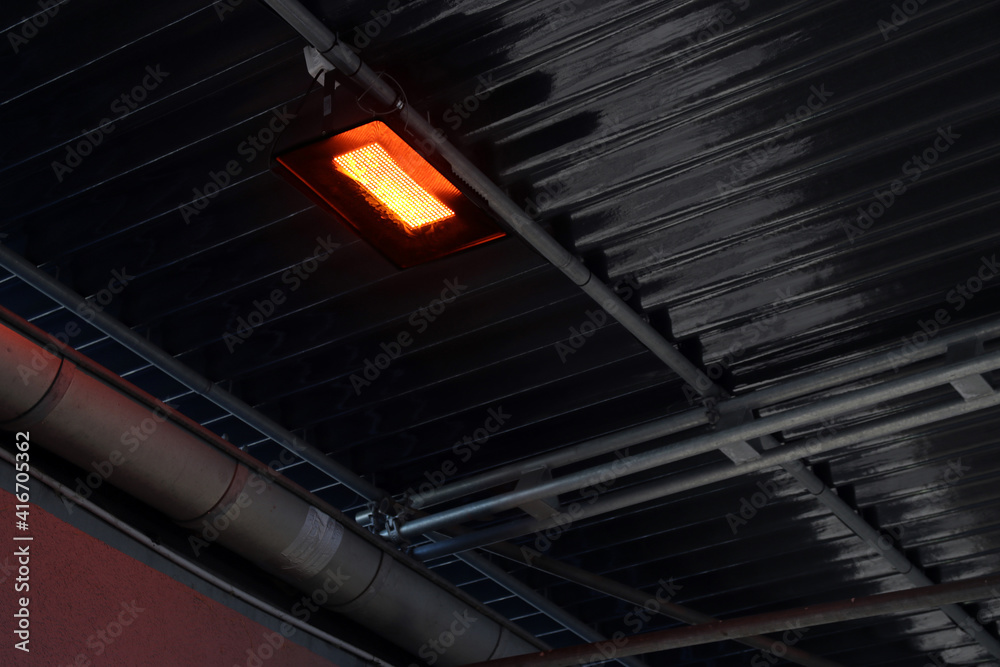 Obraz premium heizstrahler am terrassendach