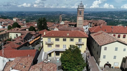 Aerial flight over La Morra is a comune in province of Cuneo in the Italian region Piedmont it has long a major in the wine growing area and a typical place to visit by tourist 4k high resolution photo