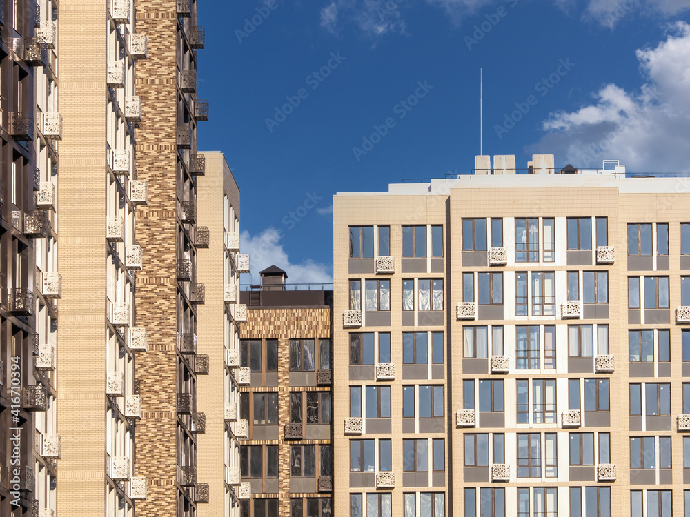 Obraz premium New modern apartment complex. Residential multi-story building