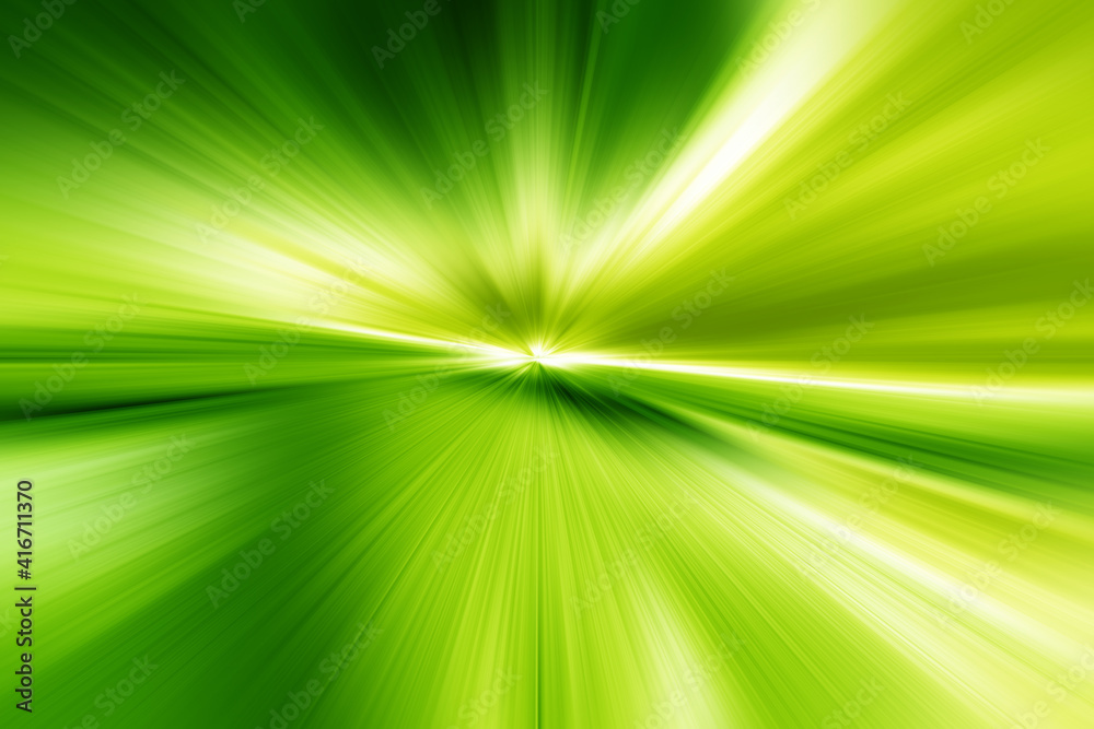 Abstract surface of radial blur zoom in green and yellow tones. Bright colorful green background with radial, diverging, converging lines. Abstract surface of radial blur zoom in green and yellow tones. Bright colorful green background with radial, diverging, converging lines.