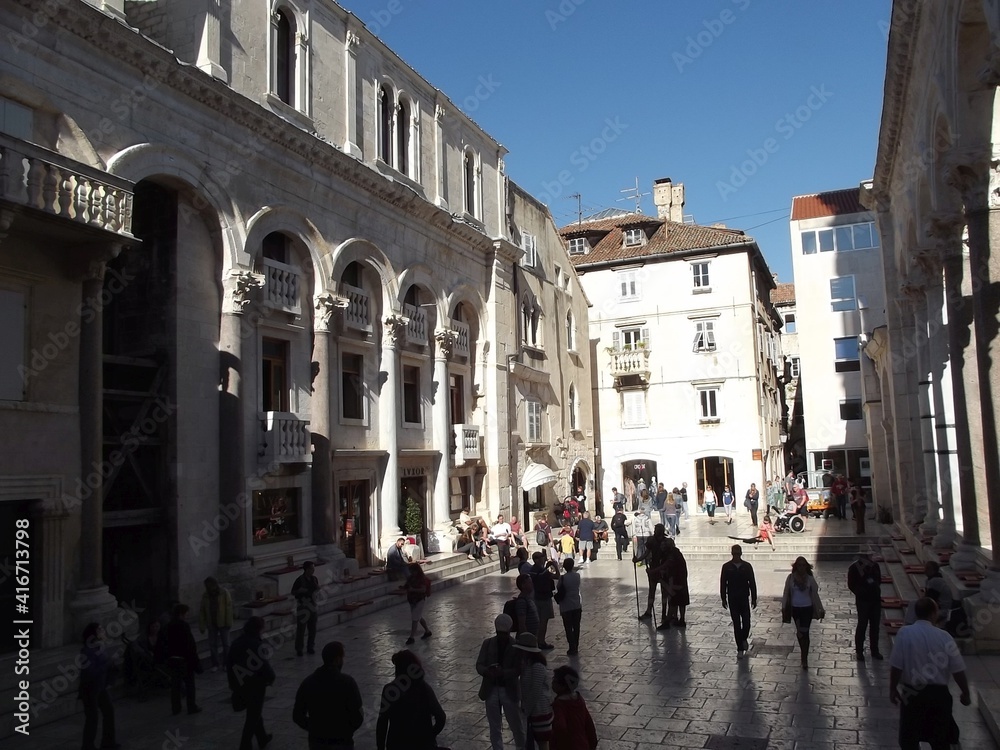 the old roman peristyl is a square within arcades an columns in front of the cathedral of holy duje, split, croatia