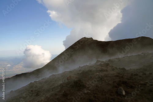 Mount Etna summit with active volcanic activity before eruption, Etna summit and crater trek hiking tour concept, Sicily, Italy