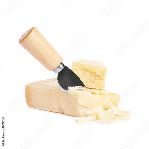 Delicious parmesan cheese and knife on white background
