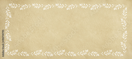 Beige background with frame of white olive twigs
