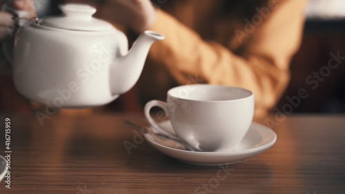 tea in a teapot mug on the table cafe breakfast How to rest