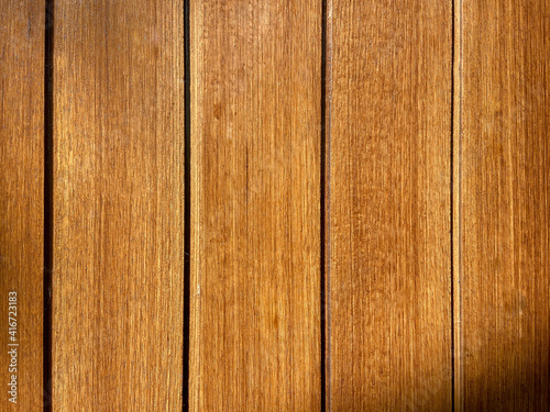 Wood wall or wooden floor in light yellow warm brown wooden texture for exterior or interior decoration or furniture design. concept seamless pattern vintage old warm wooden for interior design.