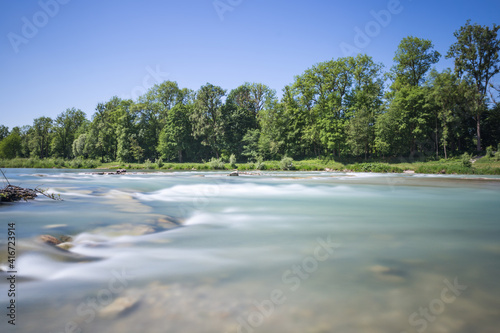 Longtime Exposure of River with River Steps and River Bank in Munich, Bavaria, Germany, Europe