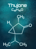 Chemical formula of Thujone on a futuristic background