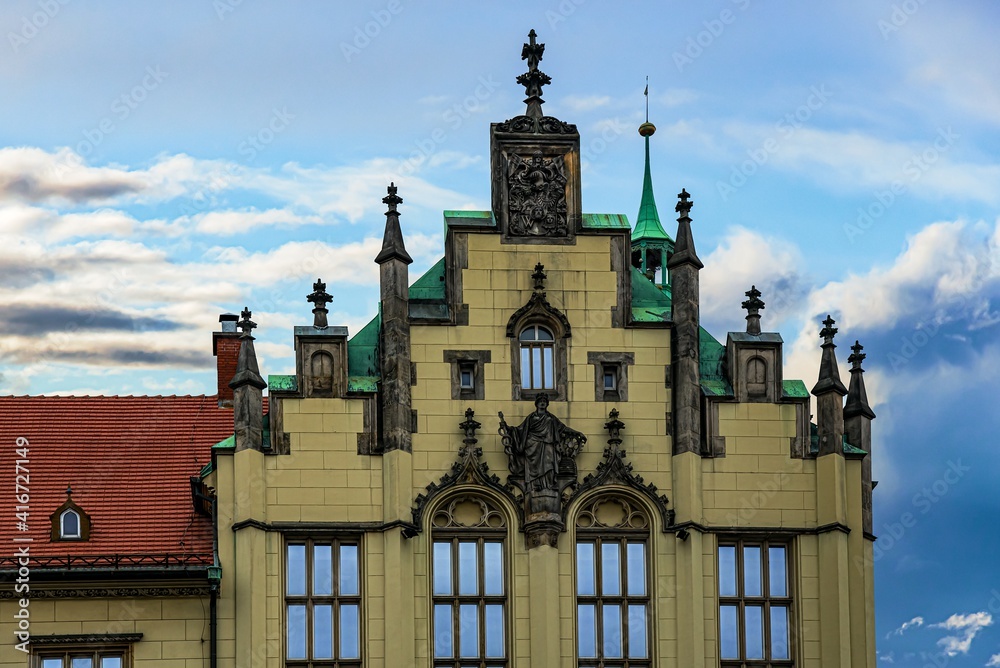 Polish culture and religion of Catholics . Beautiful colorful facades of antique building at Wroclaw, Poland 