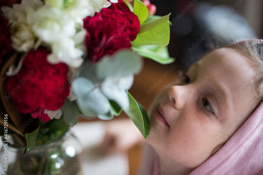 Close up of bouquet of flowers to a loved one in a glass vase Close up of bouquet of flowers to a loved one in a glass vase