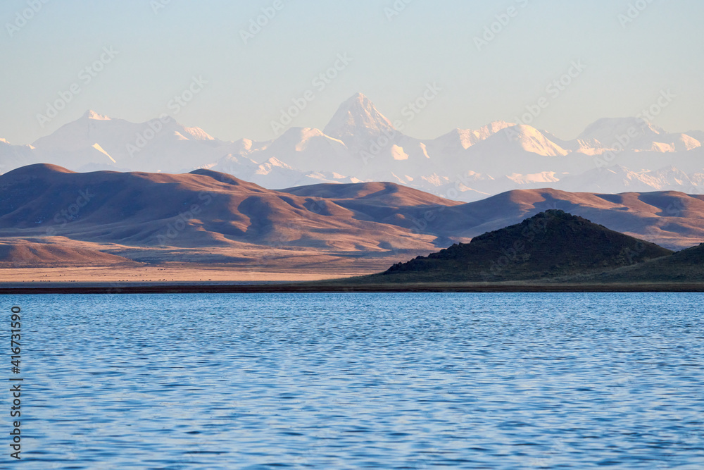 Khan-Tengri peak and Tuzkol lake.
Khan Tengri is a mountain of the Tian Shan mountain range.