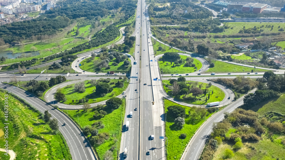 Drone view of cloverleaf interchange. Highway road junction. Portugal, Almada