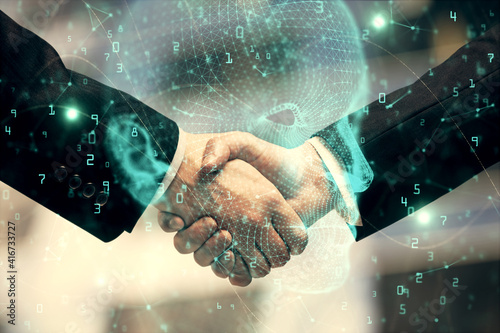 Double exposure of brain hologram and handshake of two men. Partnership in IT industry concept.