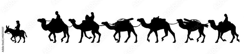 Fototapeta premium Silhouette of a camel caravan in the desert.