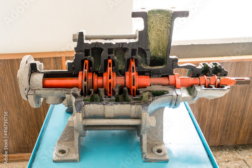 Cutaway retro engine mockup. Old pump for the mining industry. Stand for the study of electrical machines and engines.