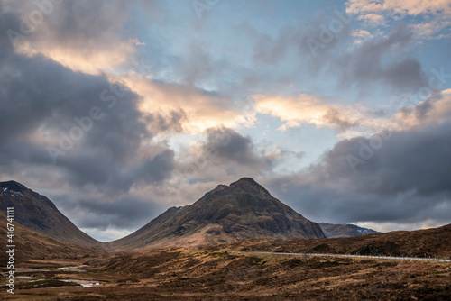 Majestic landscape image view down Glencoe Valley in Scottish Highlands with mountain ranges in dramatic Winter lighting © veneratio