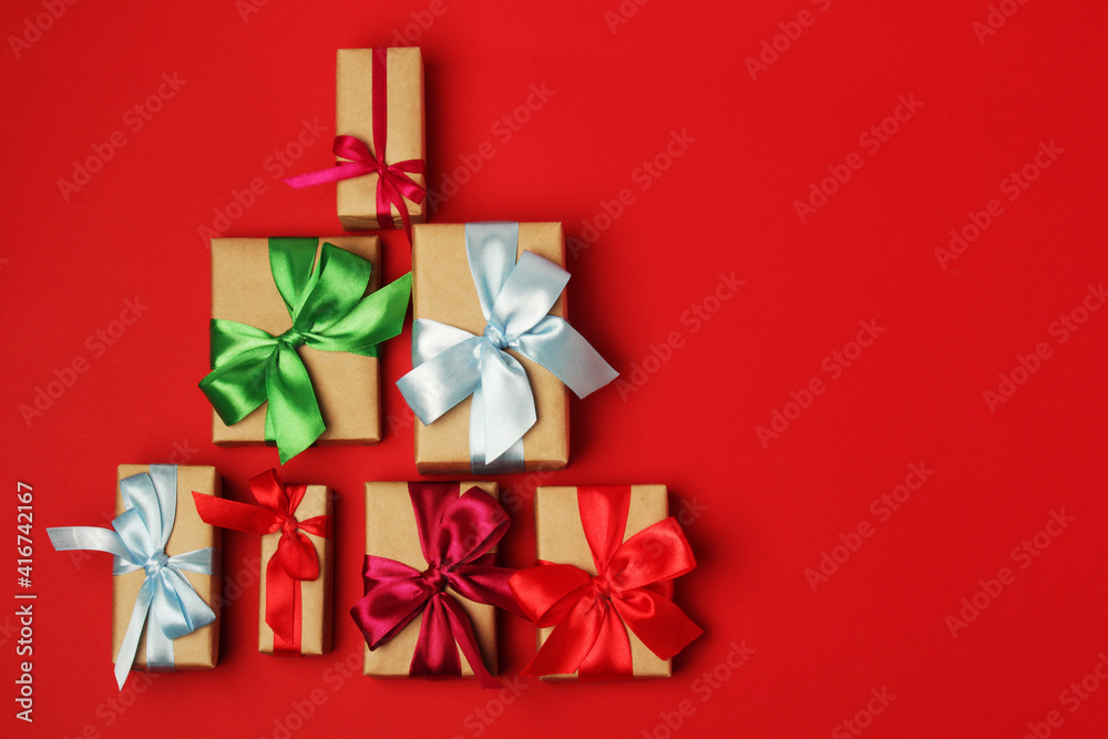 Gifts packed with craft paper and colorful satin ribbons Gifts packed with craft paper and colorful satin ribbons